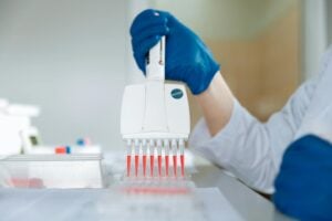 Close-up of a Lab Worker working with Capsules