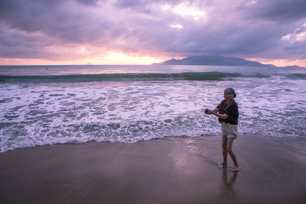 Elder under a beach sunset